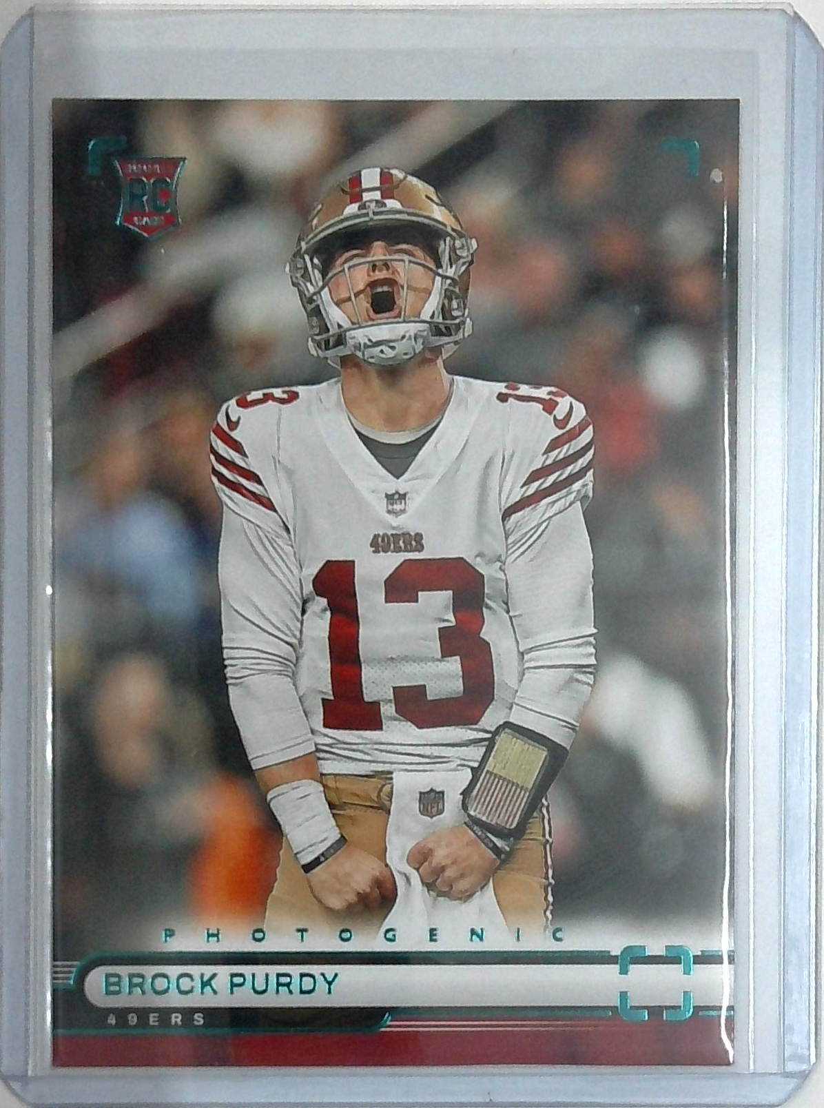 2022 Panini Chronicles Brock Purdy Photogenic Teal RC