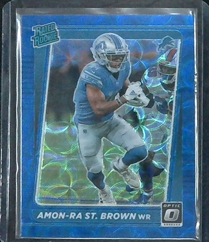 2021 Donruss Optic Amon Ra St Brown Blue Scope Prizm Rated Rookie RC #228 Lions