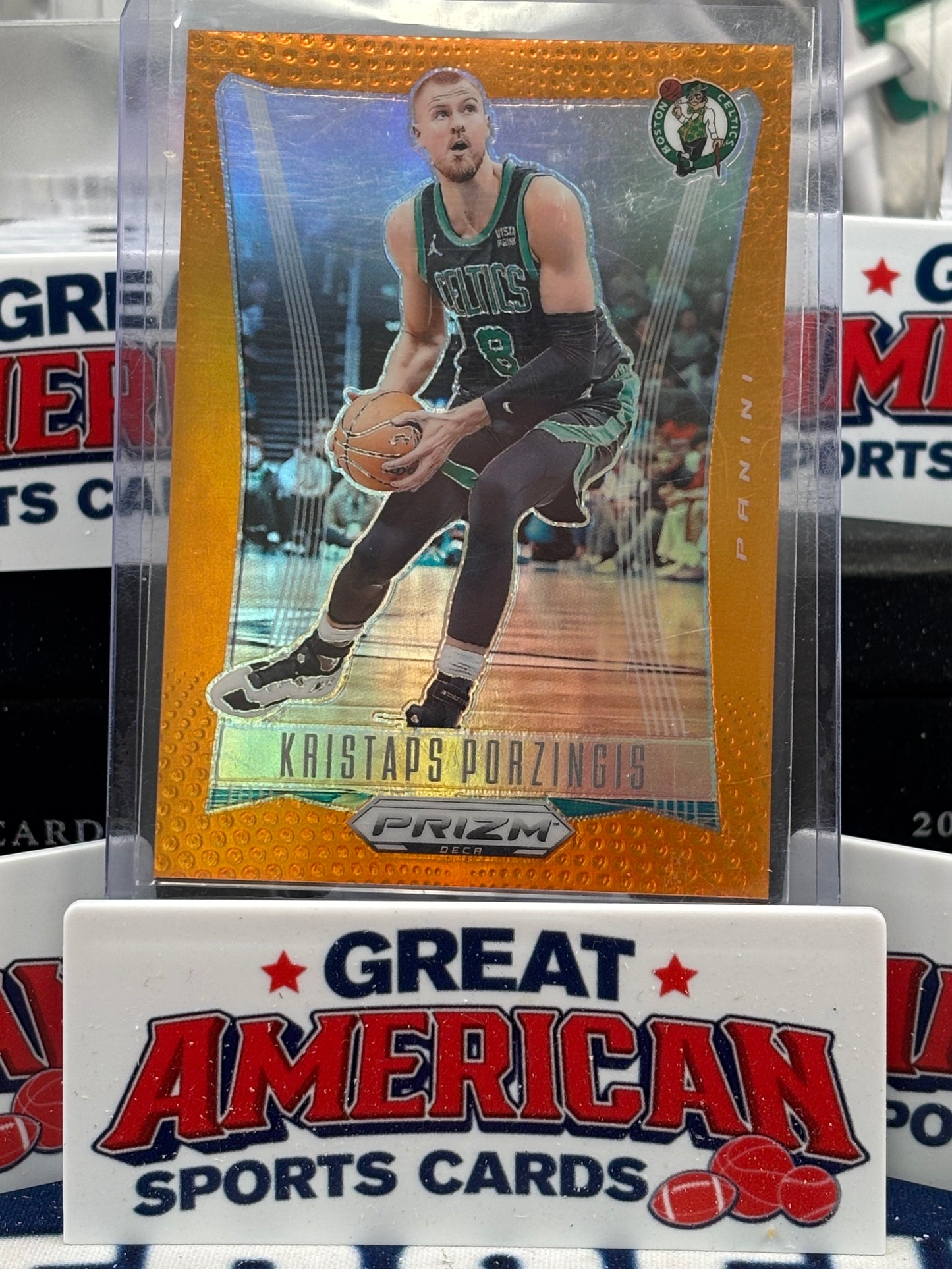 2023-24 Prizm Deca Kristaps Porzingis Orange /49