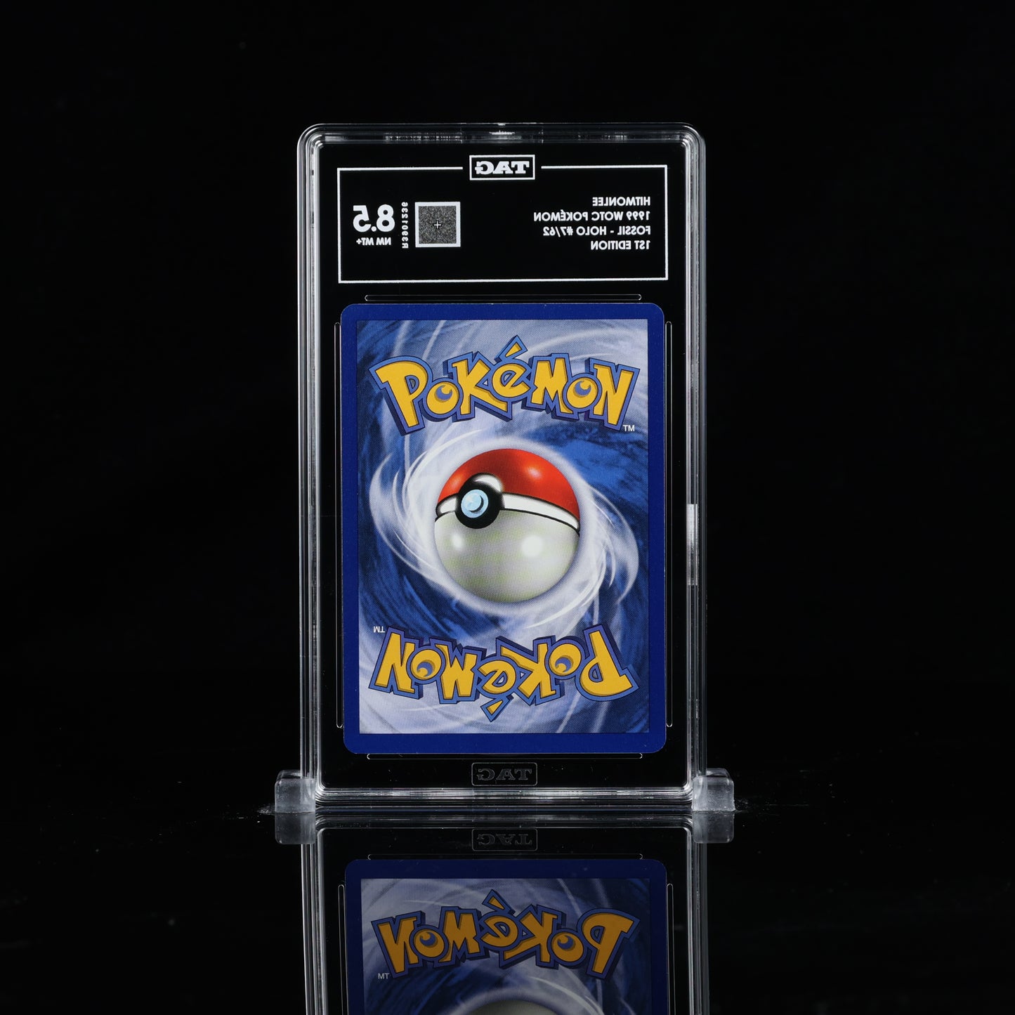 1999 POKEMON FOSSIL 1ST EDITION #7 HITMONLEE-HOLO TAG 8.5