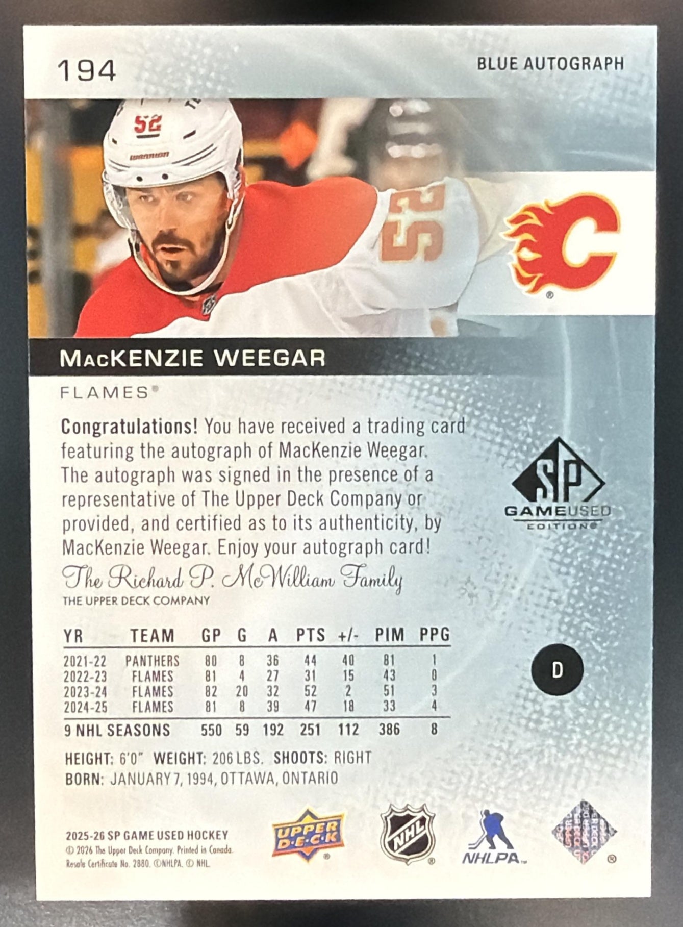 2025-26 Upper Deck SP Game Used MacKenzie Weegar #194 Blue Auto Flames — back