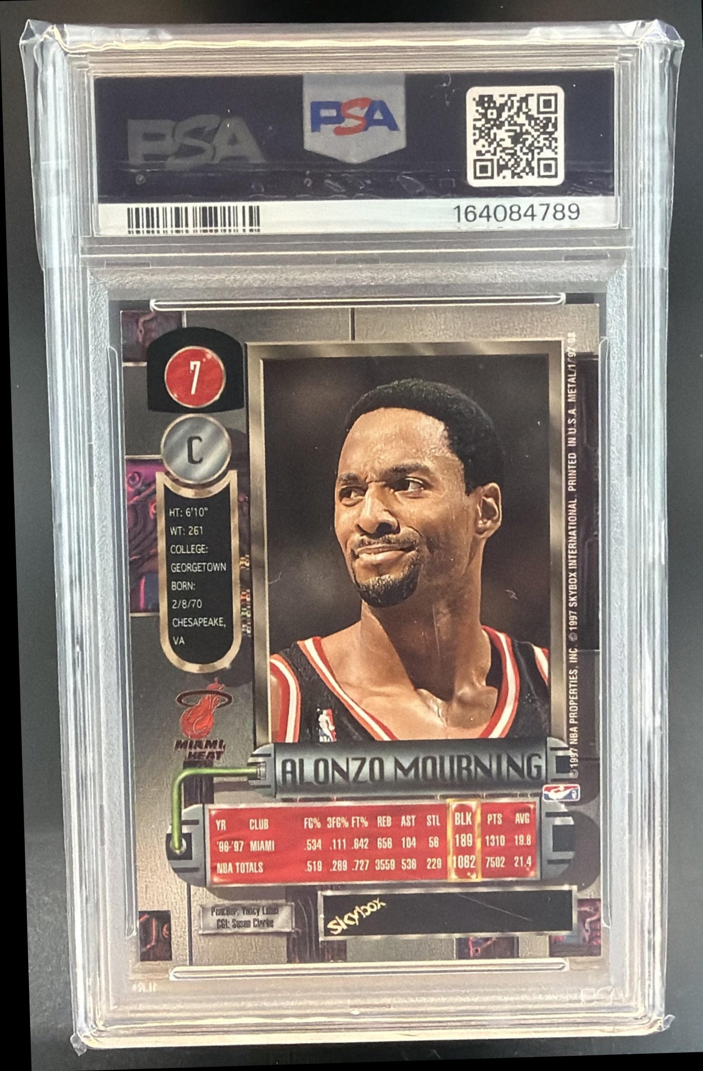 1997-98 Skybox Metal Universe Alonzo Mourning #7 Heat PSA 8 — back