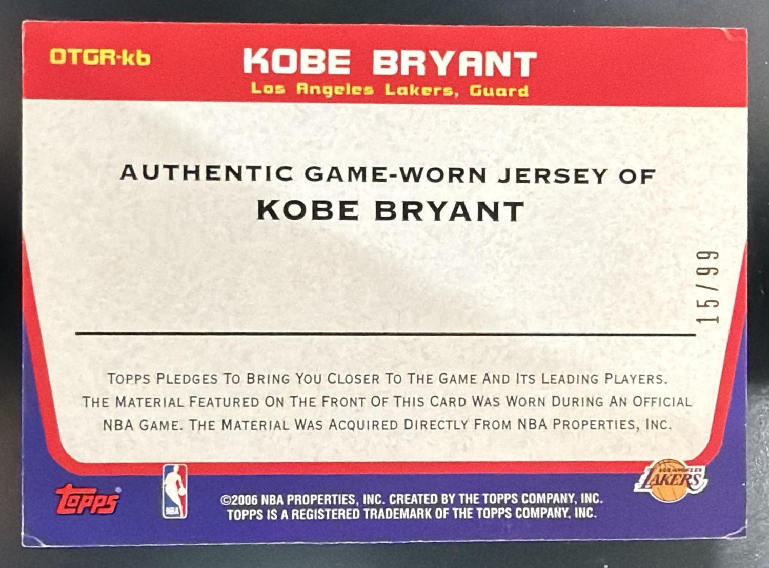 2006-07 Topps Kobe Bryant #OTGR-KB Own the Game Relics Black 15/99 Lakers — back