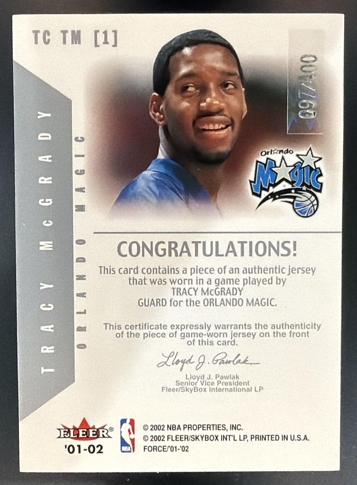 2001 Fleer Force Tracy McGrady True Colors Jerseys /100 MEM — back