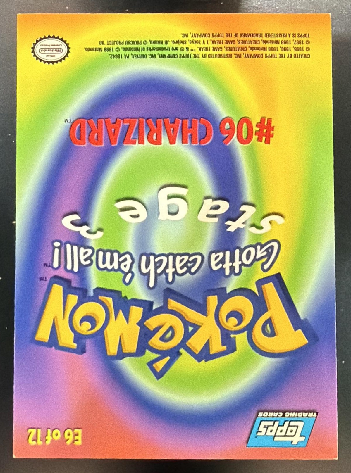 1999 Topps Pokemon the First Movie #06 Charizard - Stage 3 #E6 Blue Logo — back