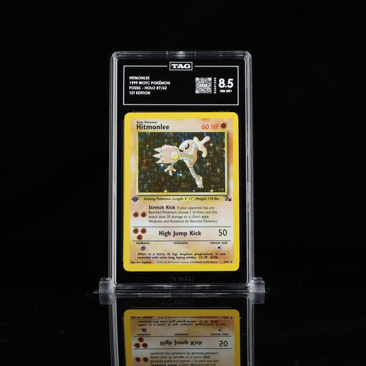 1999 POKEMON FOSSIL 1ST EDITION #7 HITMONLEE-HOLO TAG 8.5