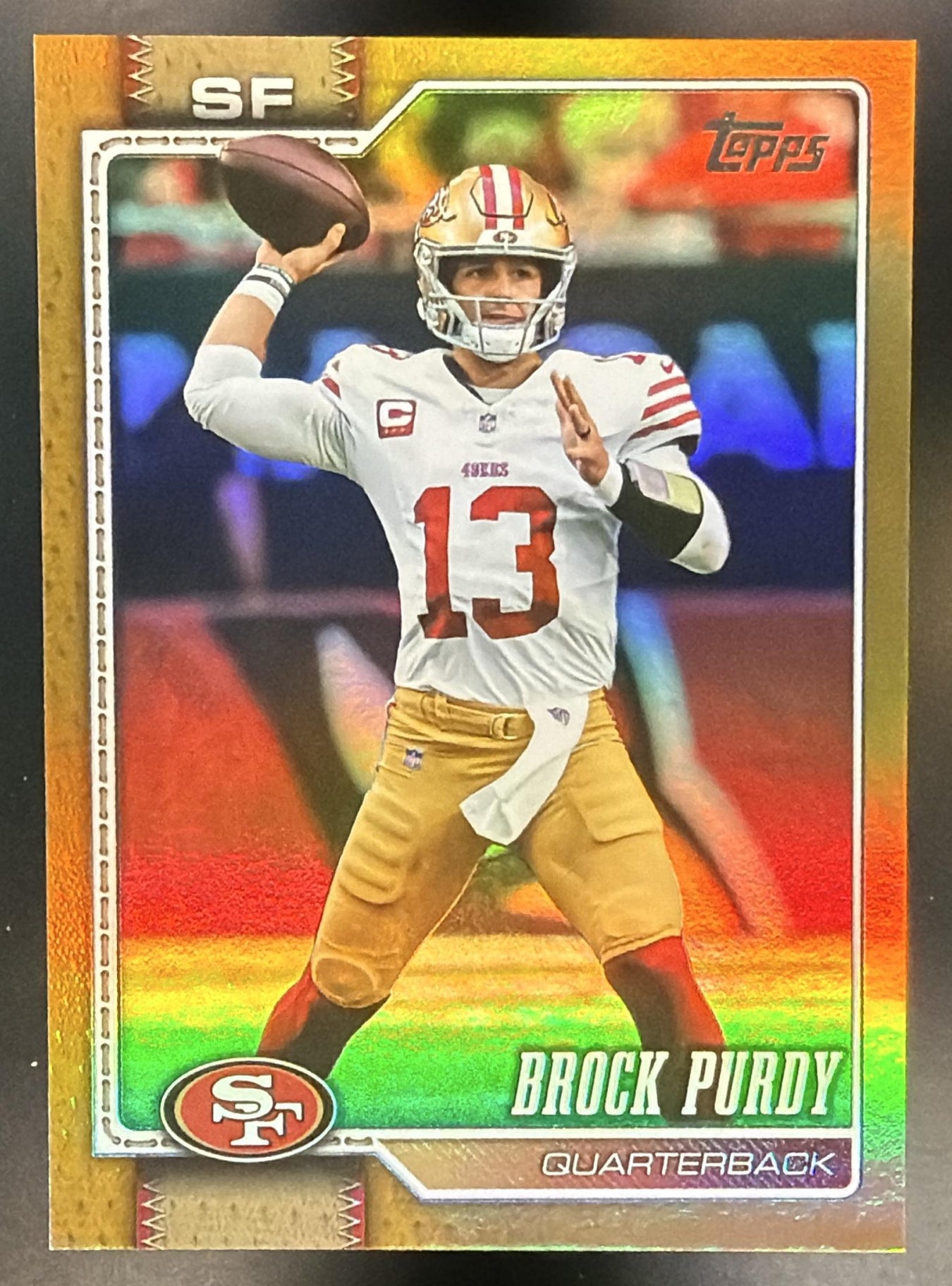 2026 Topps Brock Purdy #185 Gold Rainbow Foil 10/50 49ers — front
