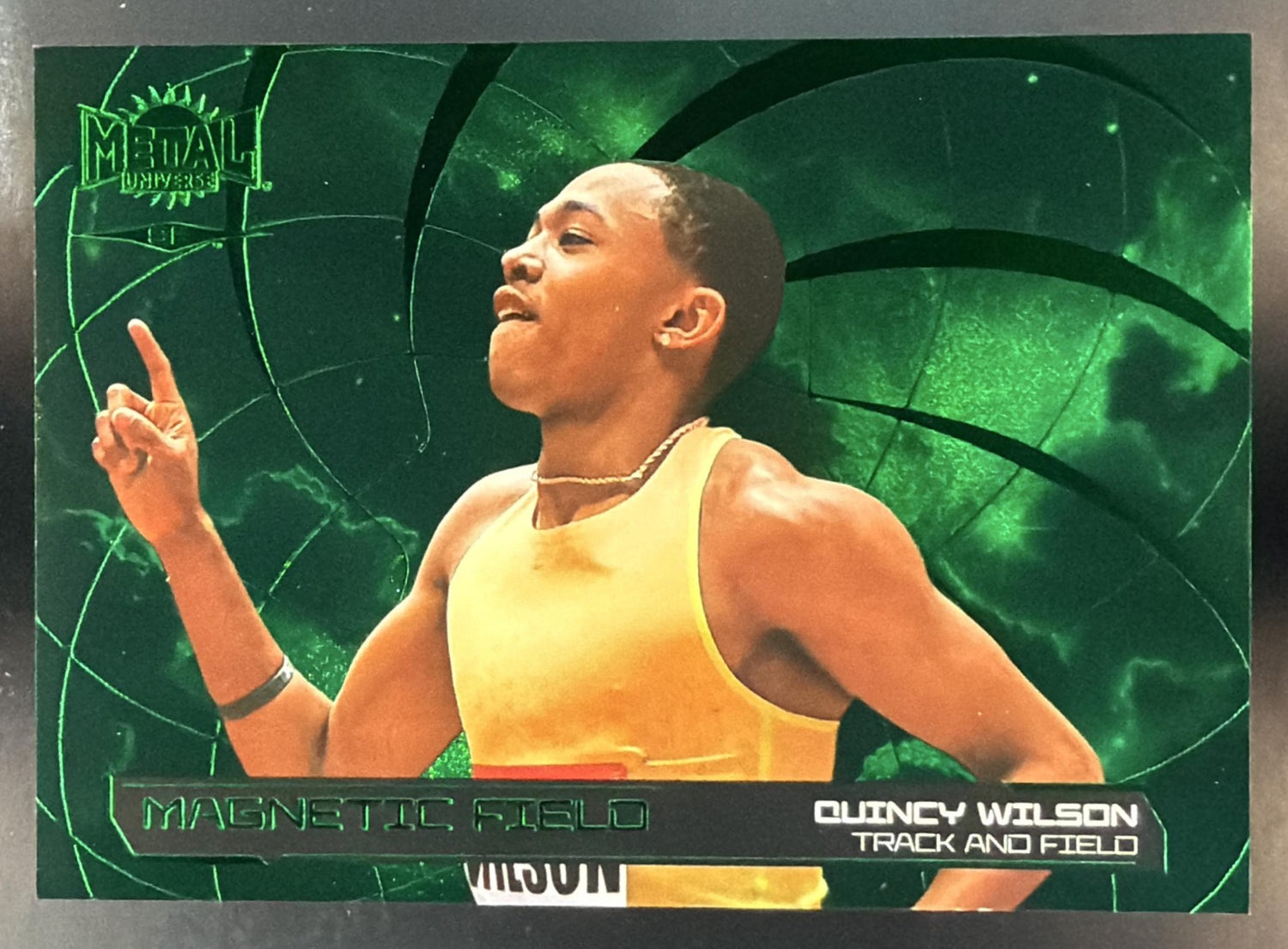 2026 Skybox Metal Universe SE Quincy Wilson Magnetic Field Green /99 — front