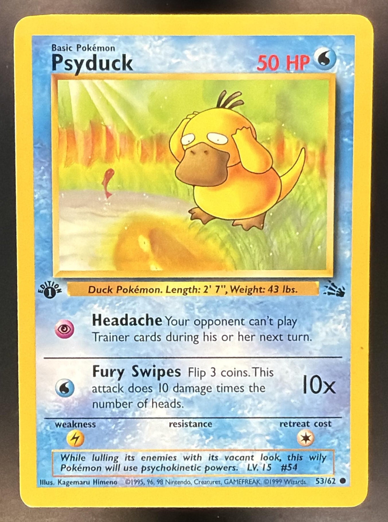 1999 Pokemon Fossil 1st Edition Psyduck #53/62 — front