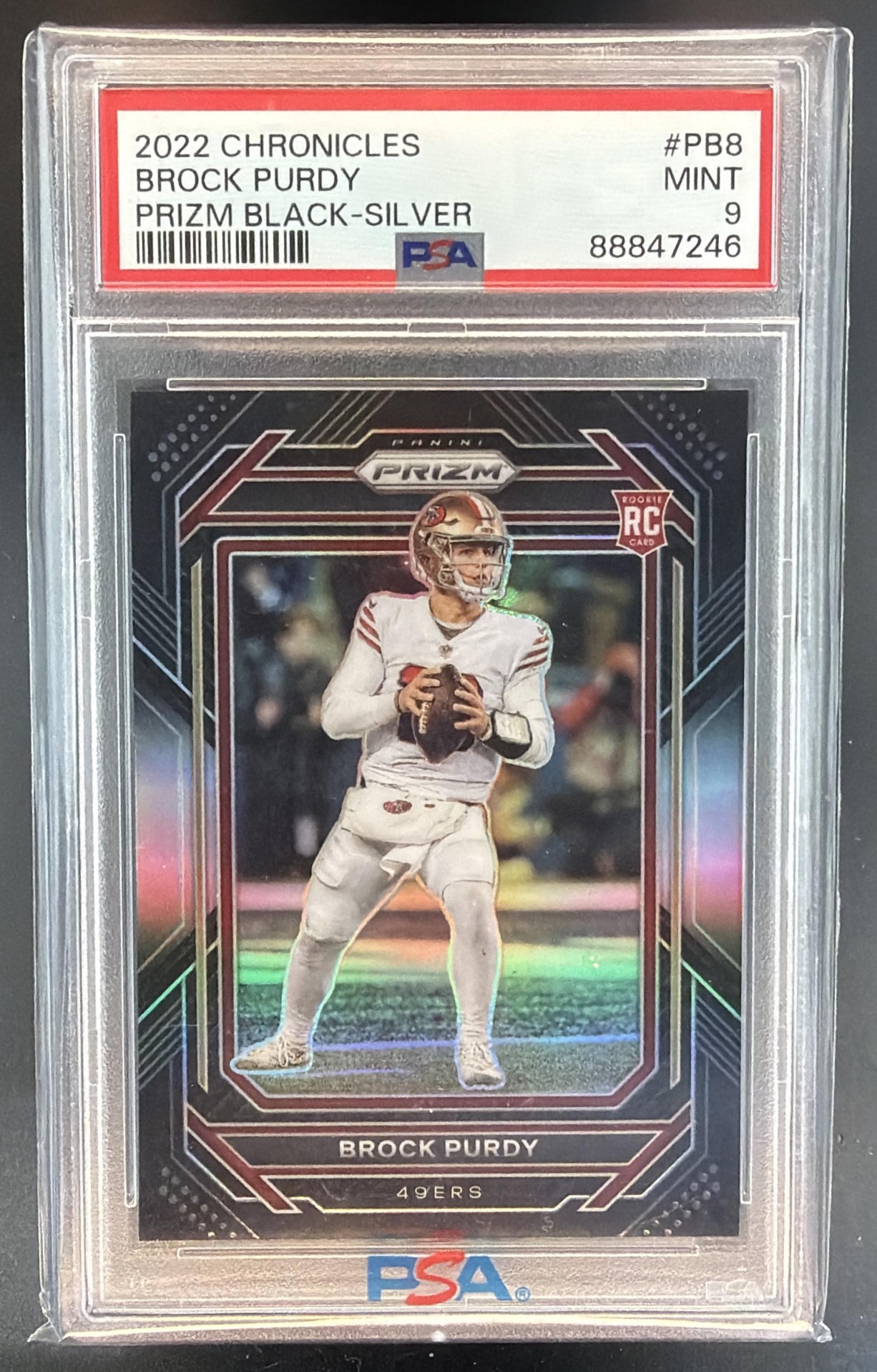 2022 Panini Chronicles Brock Purdy #PB-8 Prizm Black Silver RC 49ers PSA 9 — front