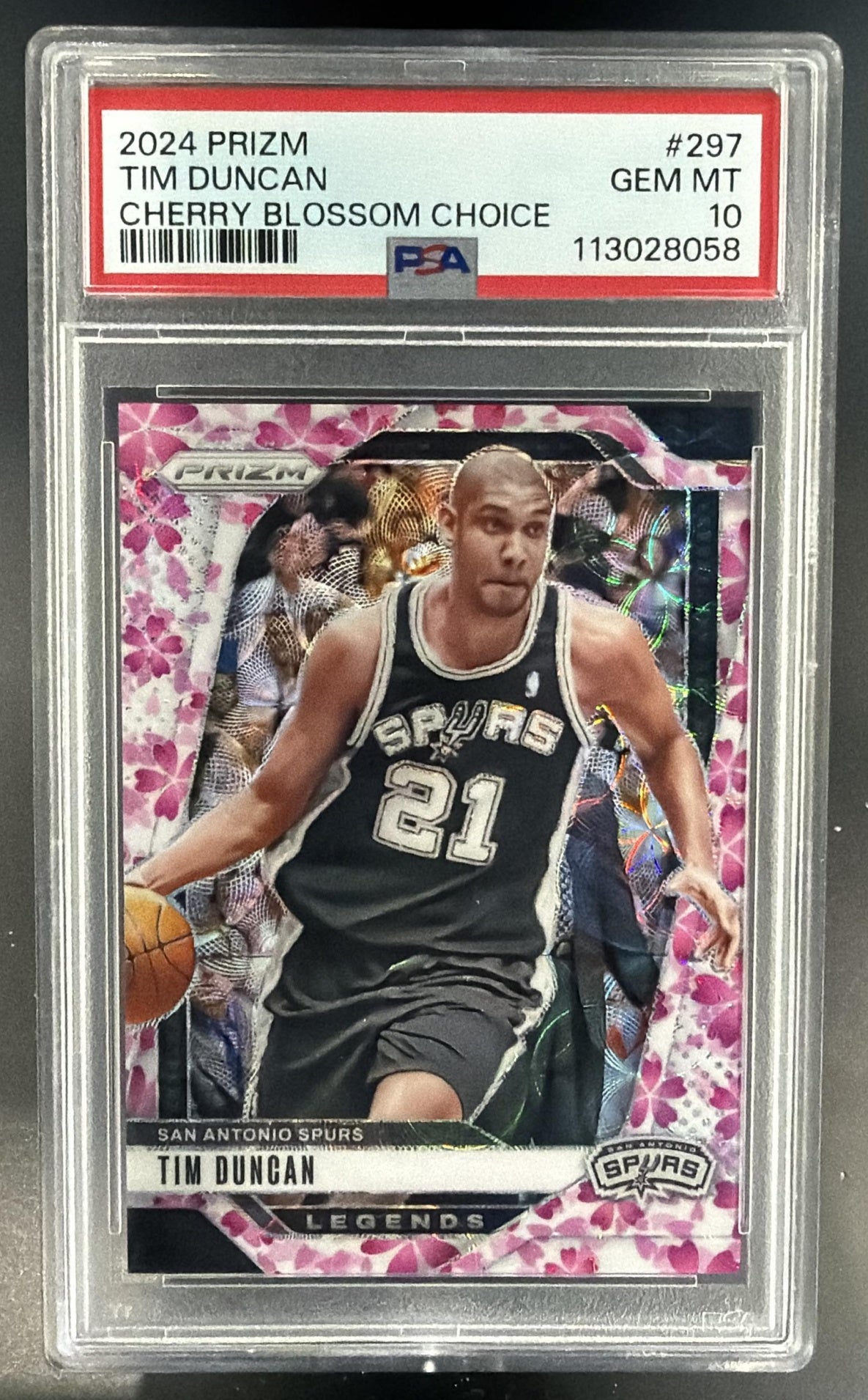 2024-25 Panini Prizm Tim Duncan #297 Choice Cherry Blossom 12/20 Spurs PSA 10 — front