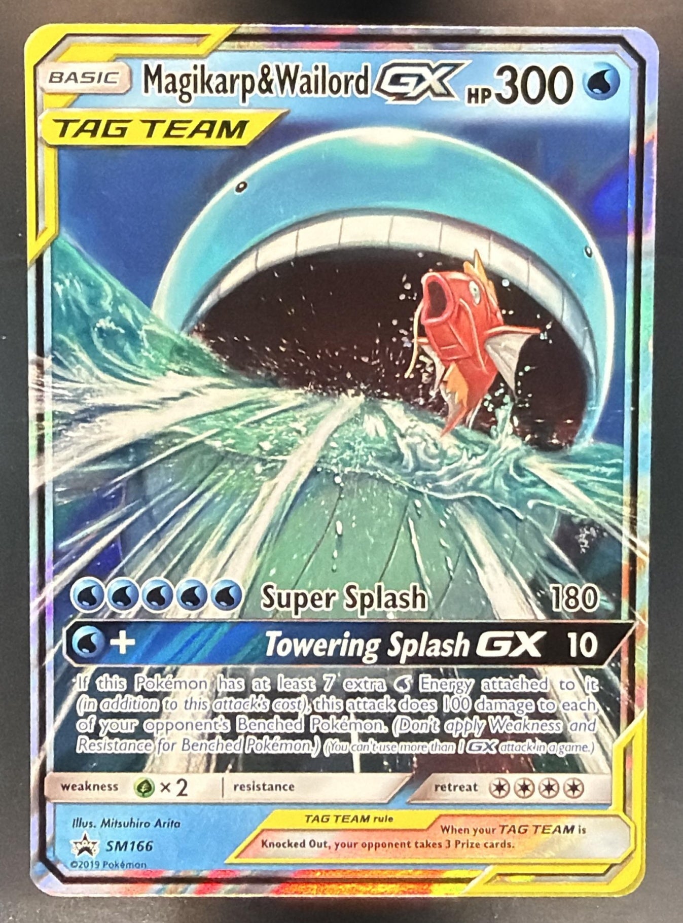 Pokemon SM Black Star Promos Magikarp & Wailord Tag Team #SM166 — front