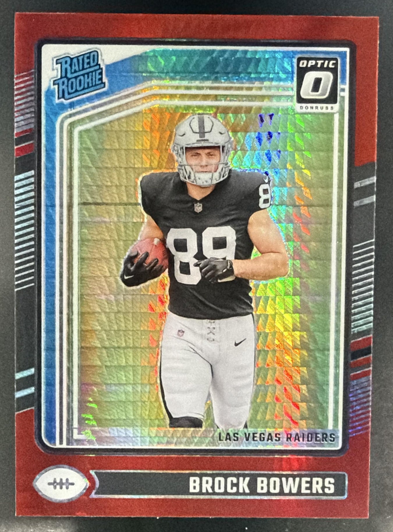 2024 Panini Donruss Optic Brock Bowers #215 Red Hyper Rated Rookie Raiders — front