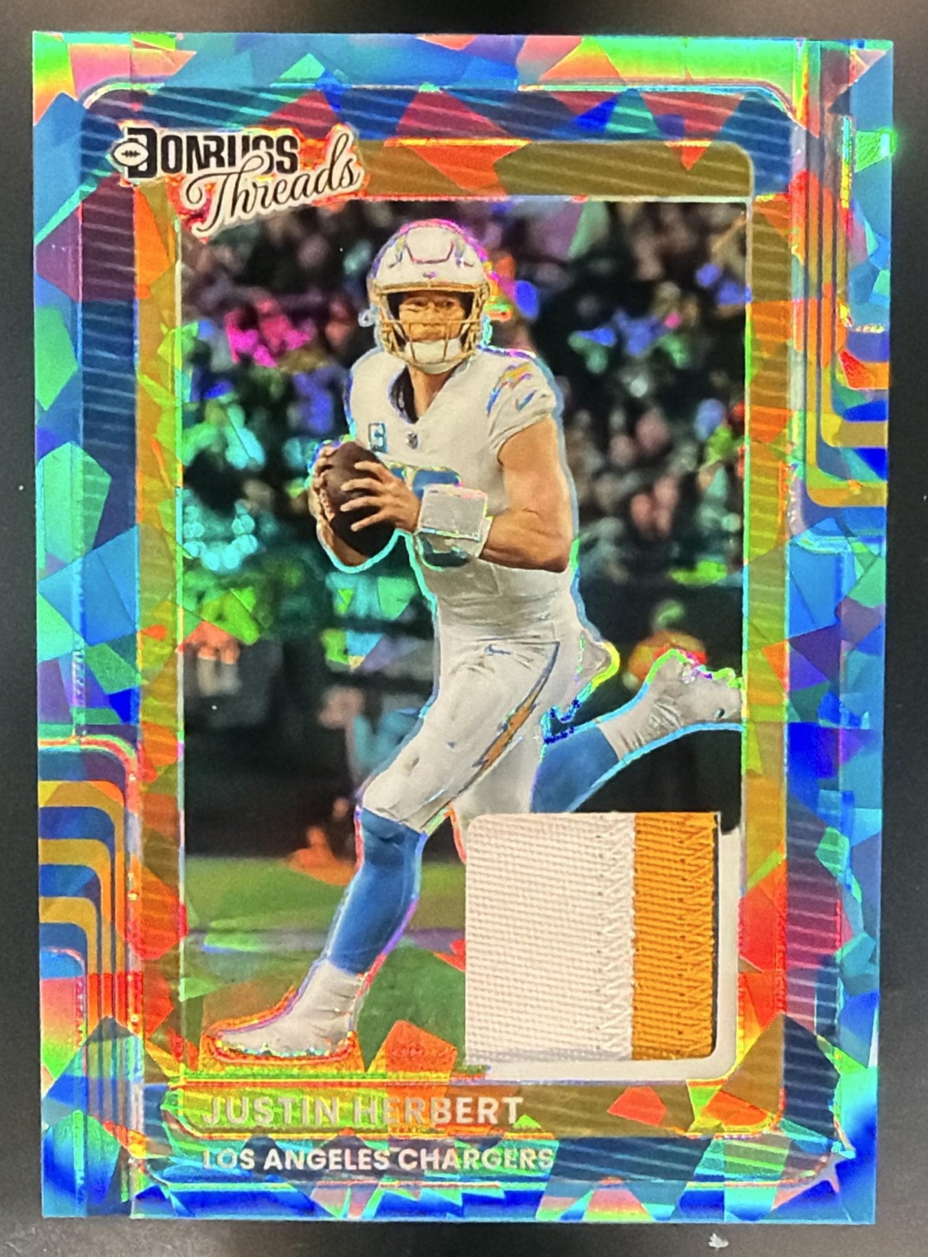 2025 Panini Donruss Optic Justin Herbert #DTH-JHB Threads Ice Prizm /49 MEM — front
