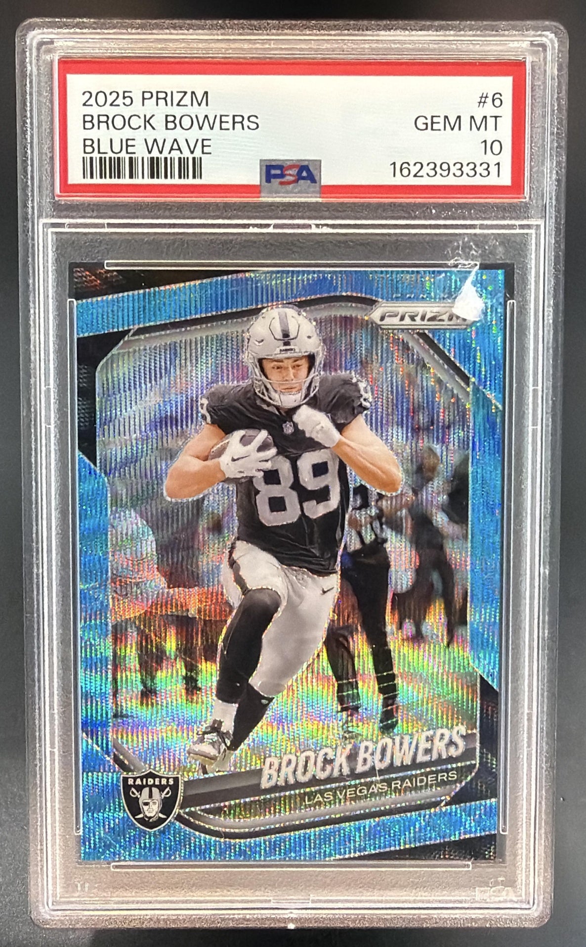 2025 Panini Prizm Brock Bowers #6 Blue Wave 51/230 Raiders PSA 10 — front